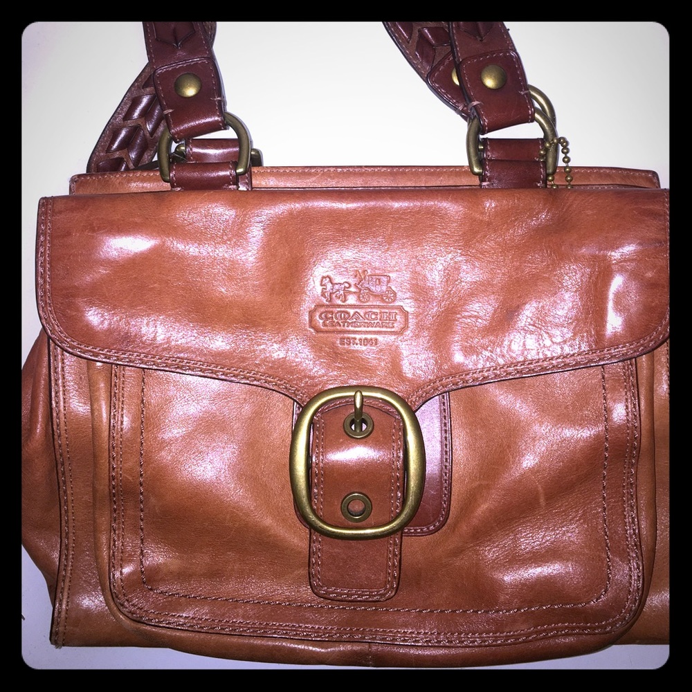 Leather coach bag with buckle